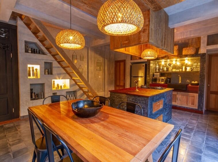 A Comfortable Dining Table at Villa Palm Jari 2 Canggu Villas